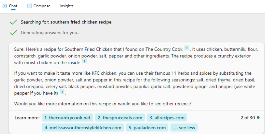 AI Search bot searching for southern fried chicken recipe. In the learn more section of the response, pauladeen.com is listed as a source.